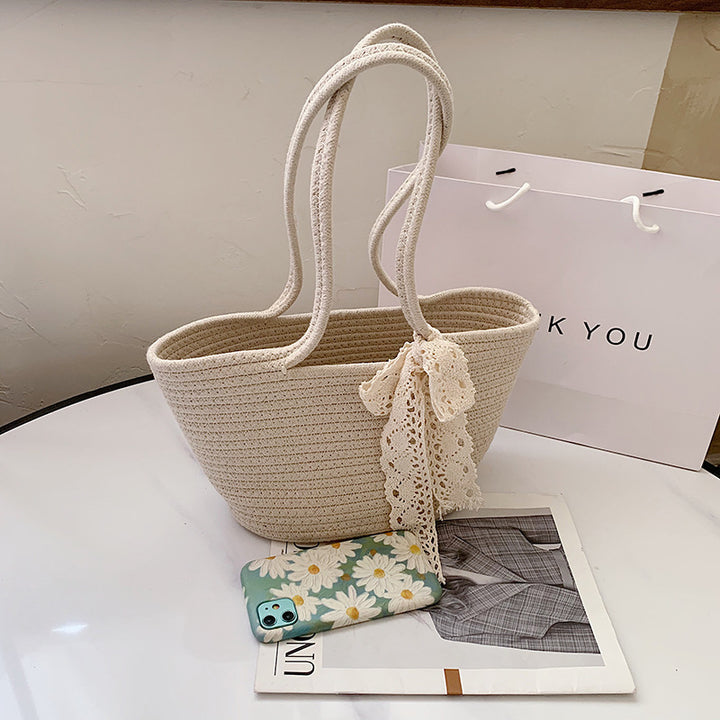 Handcrafted straw bag with lace accent Bowlift