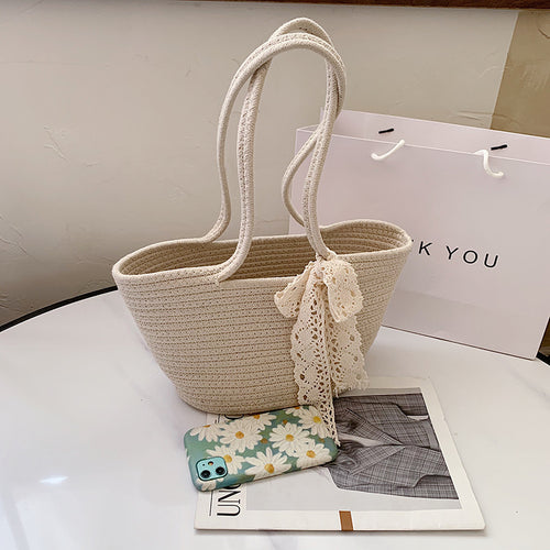 Handcrafted straw bag with lace accent Bowlift