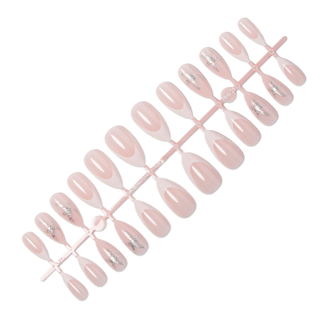 Artificial nail set with delicate pearlescent and glitter accents Bowlift