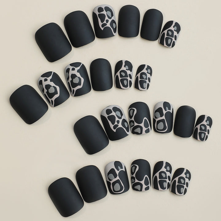 Artistic Press-On Nail Set with Elegant Design Elements Bowlift