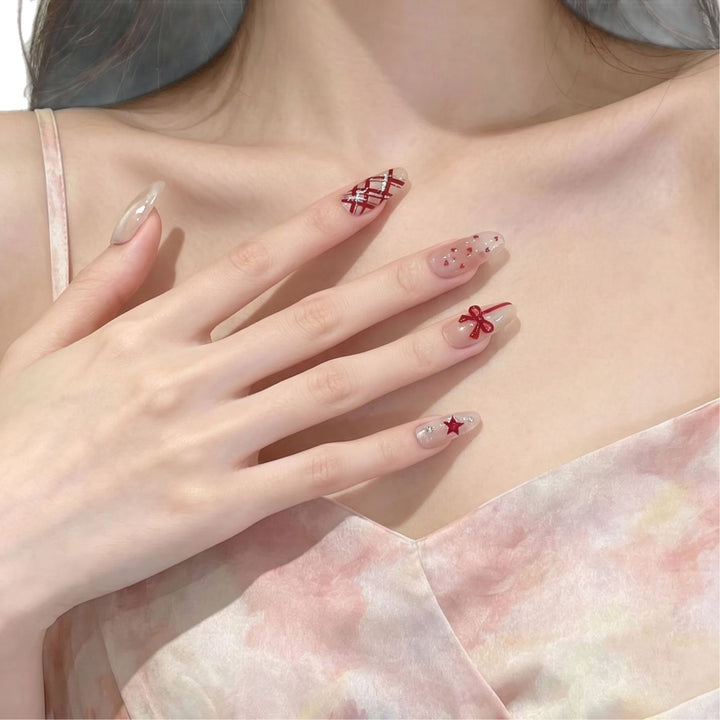 Romantic Themed Press-On Nail Set with Heart and Bow Accents Bowlift