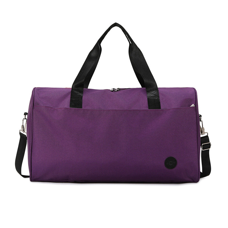 Sporty travel bag with sturdy carrying handles and removable shoulder strap Bowlift