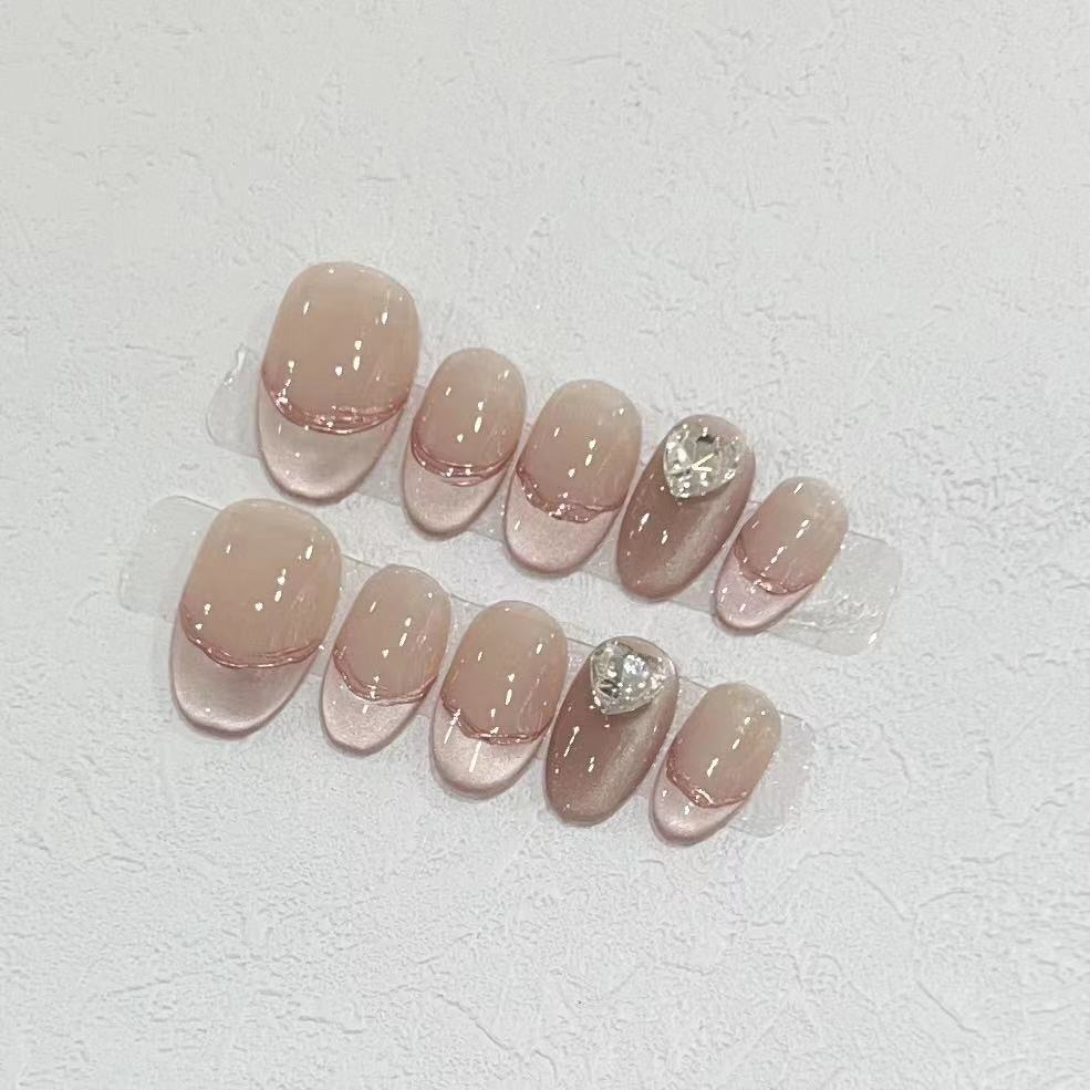 Elegant Press-On Nail Set with Jewel Accents Bowlift