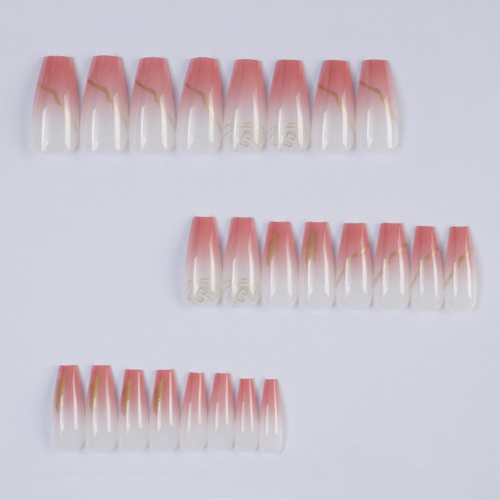 Artificial nails with elegant gradient color and golden accent decoration Bowlift