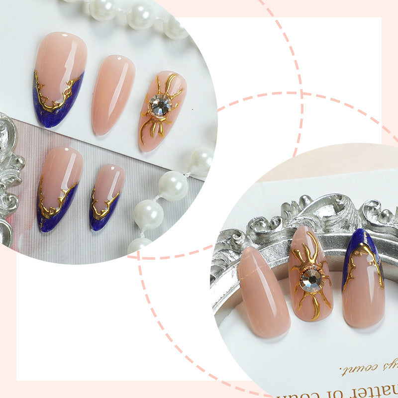 Nail art set with elegant gold-blue design Bowlift