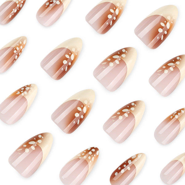 Elegant artificial nails with trendy ombre design and creative accents Bowlift