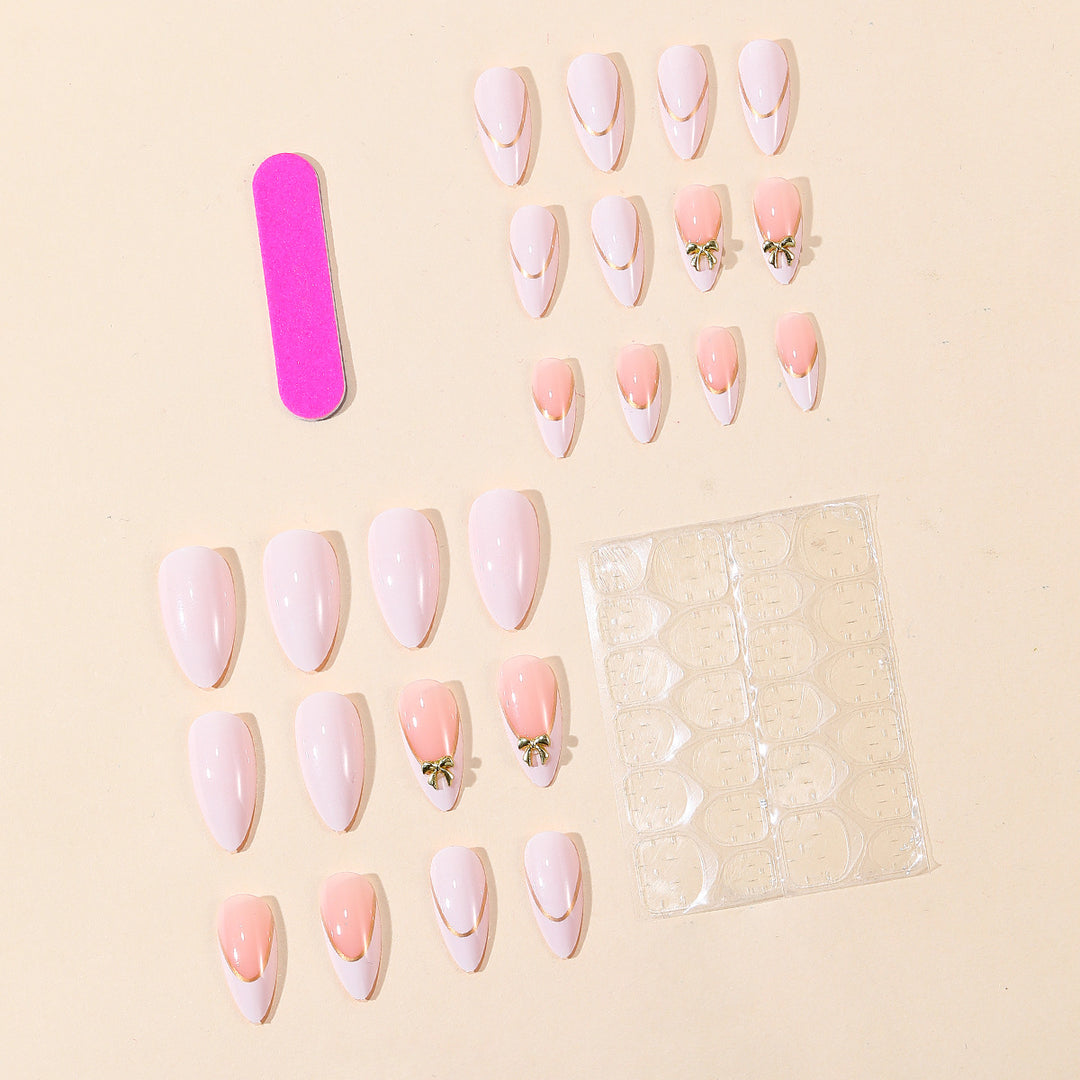 Elegant Stiletto Nail Art Extensions with Decorative Bow Accents Bowlift