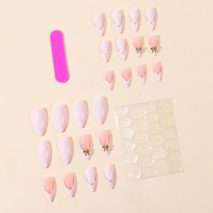 Elegant Stiletto Nail Art Extensions with Decorative Bow Accents Bowlift