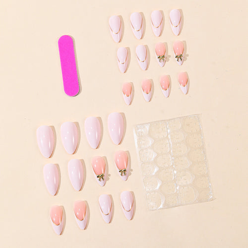 Elegant Stiletto Nail Art Extensions with Decorative Bow Accents Bowlift