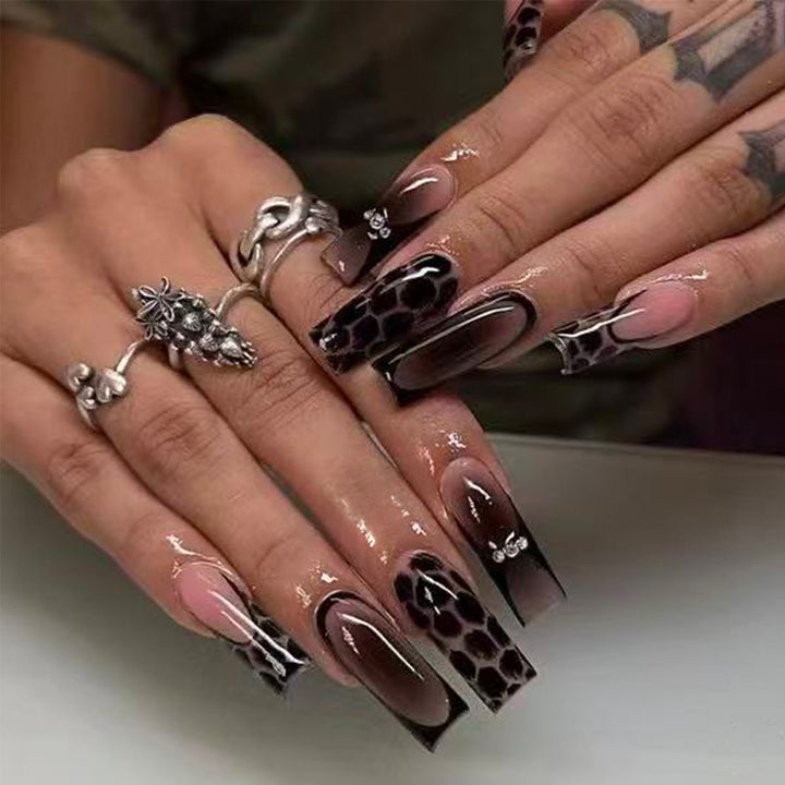 Artistic Long Press-On Nails with Glossy Animal Print Design Bowlift