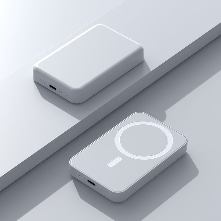 Portable power bank with Qi-compatible magnetic charging and integrated fast charging function Bowlift