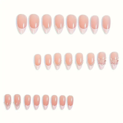 Art nail tips with delicate pearl and butterfly accents Bowlift