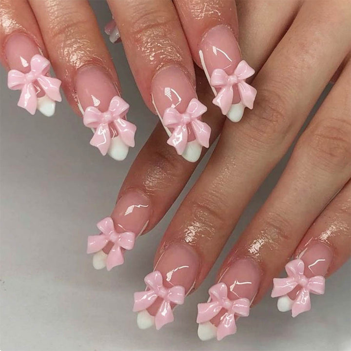 Nail art set with playful bow accents Bowlift