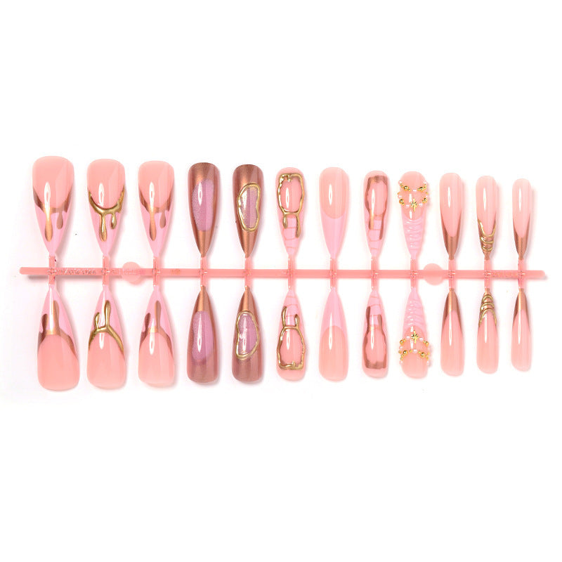 Artificial nail set with glamorous gold accents and elegant designs Bowlift