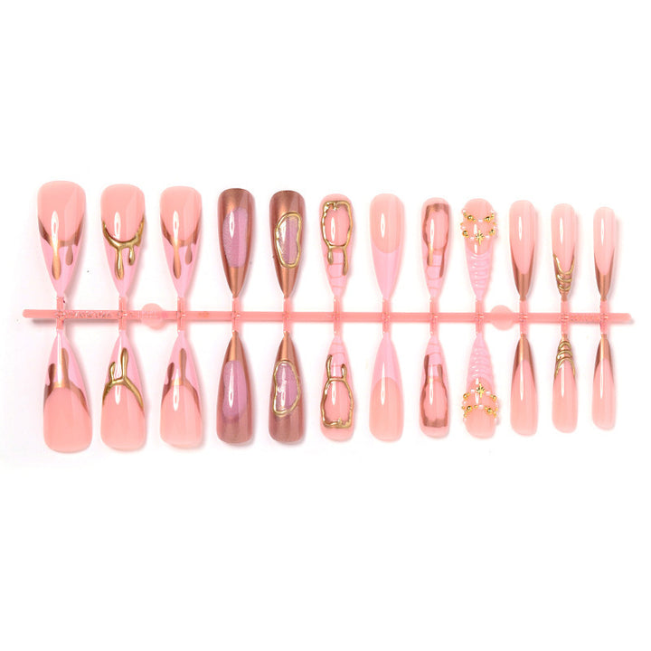 Artificial nail set with glamorous gold accents and elegant designs Bowlift