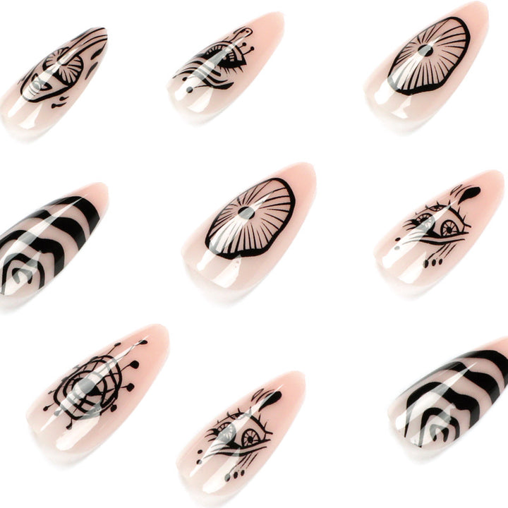 Artistic acrylic nails in elegant stiletto design with graphic patterns Bowlift