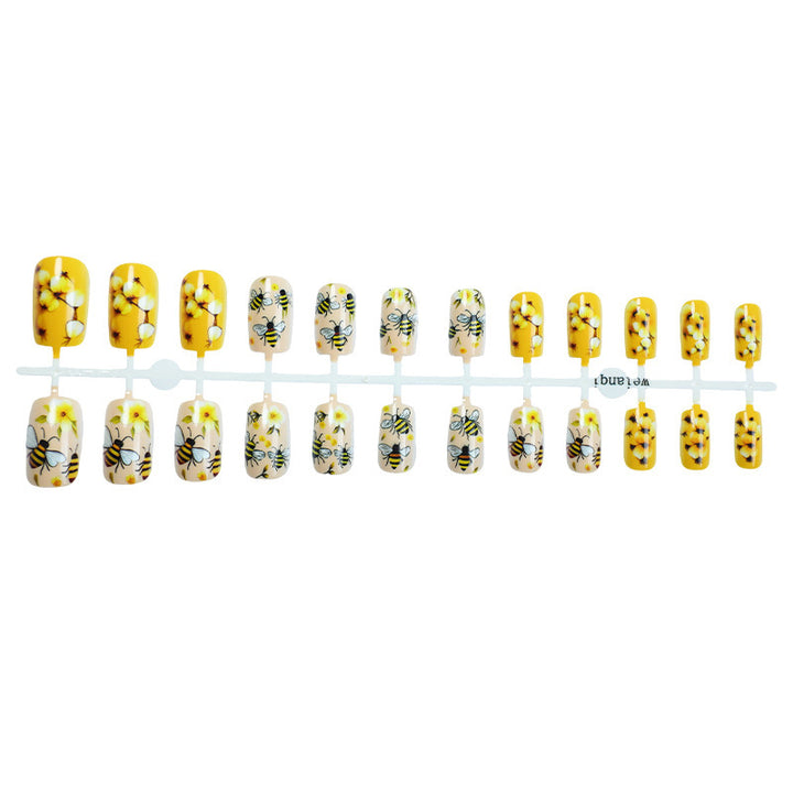 Artificial nail set with floral and bee motifs Bowlift