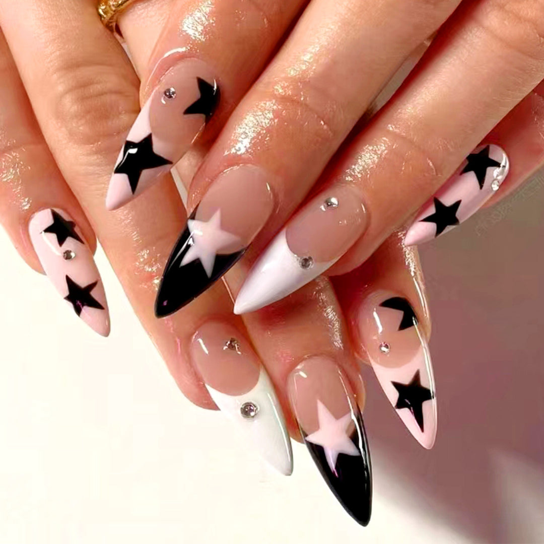 Artistic stiletto nails with star motif Bowlift