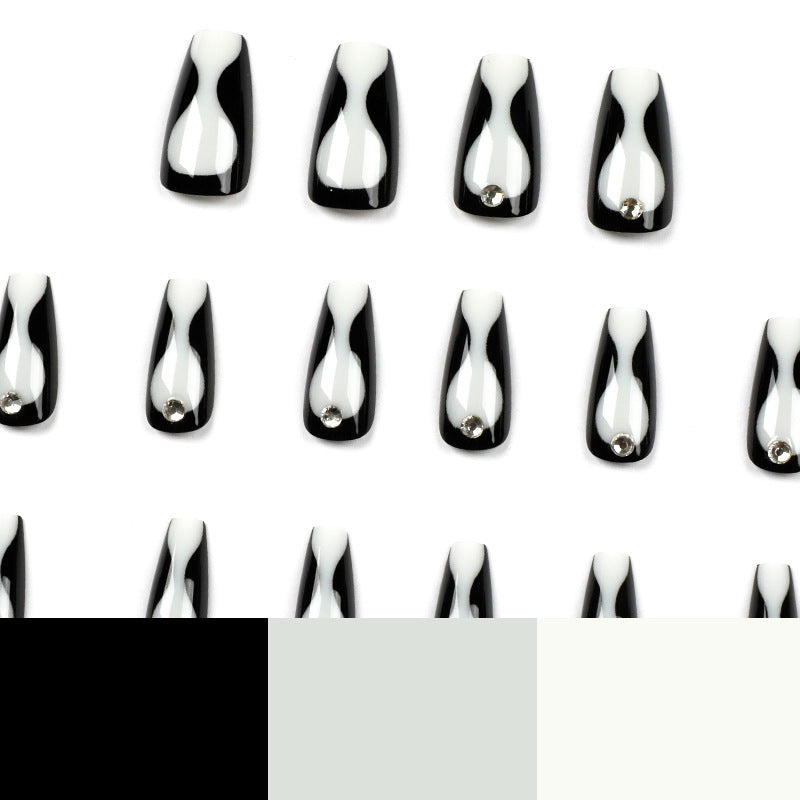 Artistic nail extensions with elegant accents Bowlift