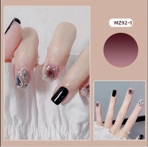 Elegant nail design with bow and rhinestone details Bowlift