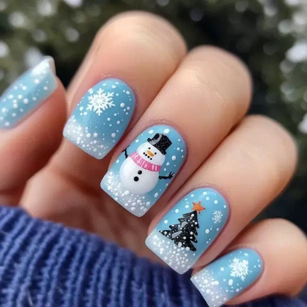 Artificial nail set with winter motifs and festive accents Bowlift