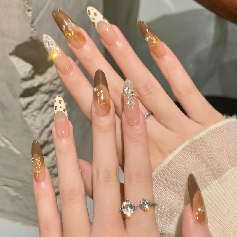 Glamorous artificial nails with creative embellishments Bowlift