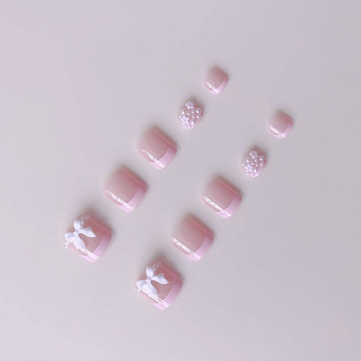 Nail art set with cute 3D bows and pearl embellishments Bowlift