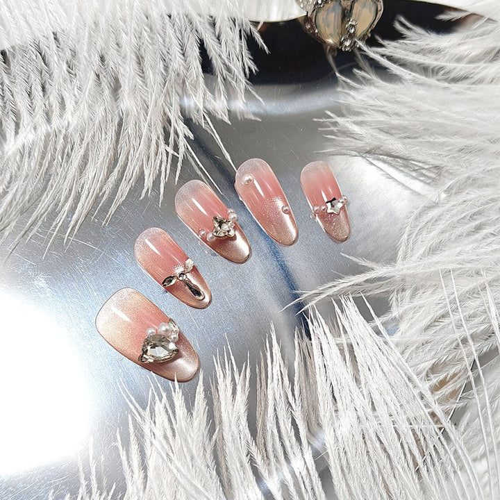 Glamorous artificial nail set with elegant rhinestone applications Bowlift