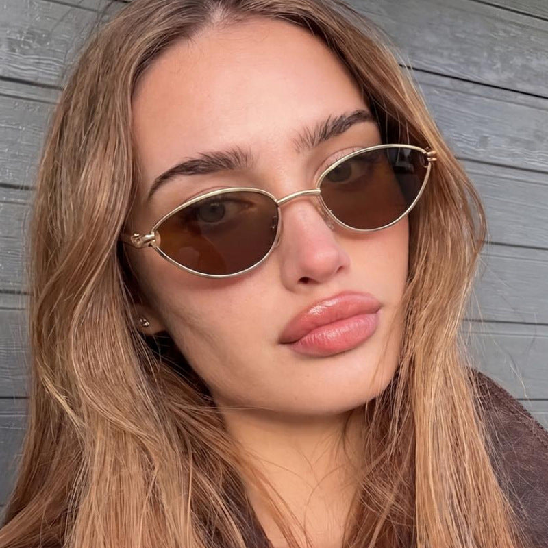 Women's designer sunglasses with elegant metal frame and protective lenses Bowlift