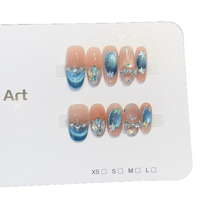 Artificial nail tips with glitter and watercolor effect Bowlift