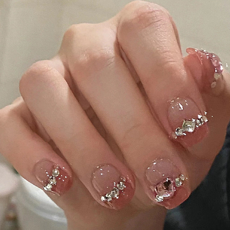 Glamorous nail art with rhinestone details Bowlift