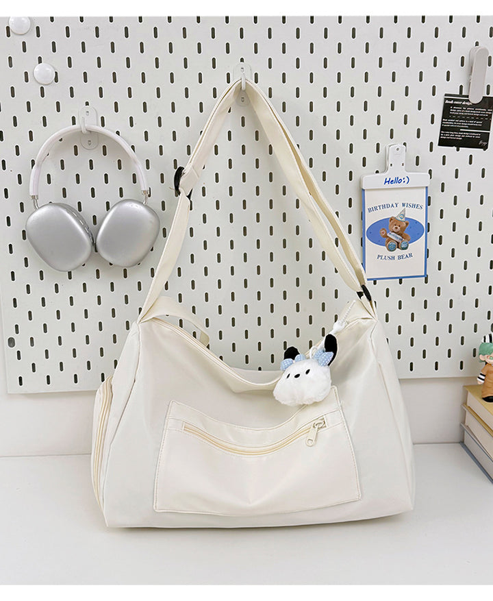 Sporty shoulder bag with spacious interior and sturdy carrying strap Bowlift
