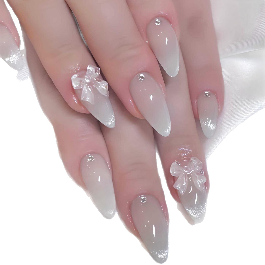 Elegant Stiletto-Shaped Press-On Nails with Decorative Bow Accents Bowlift
