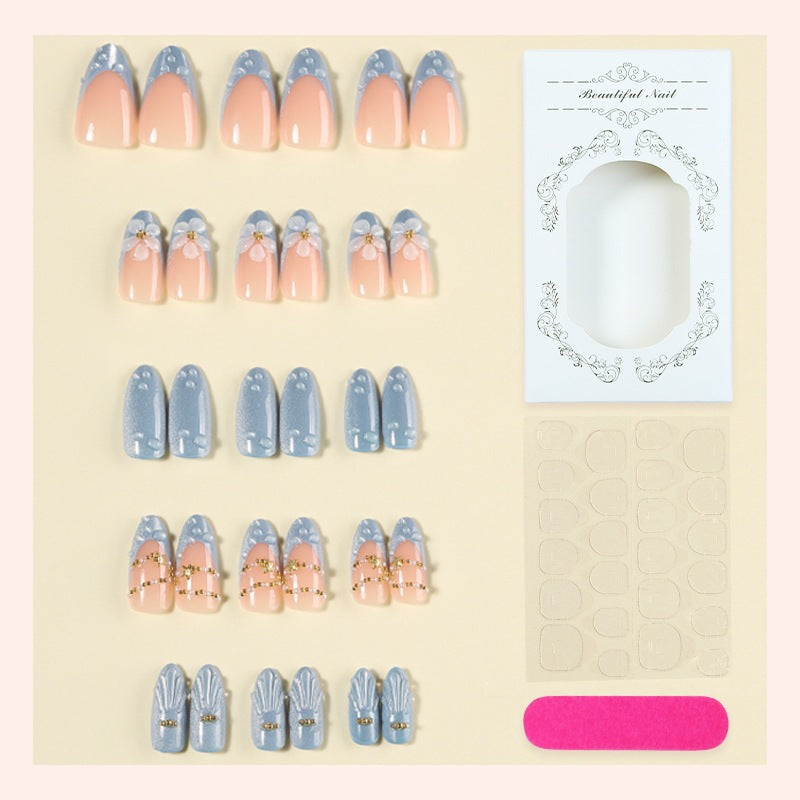Creative acrylic nail set with elegant flower and glitter accents Bowlift