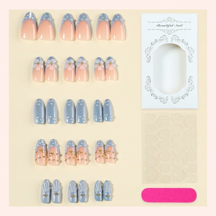 Creative acrylic nail set with elegant flower and glitter accents Bowlift
