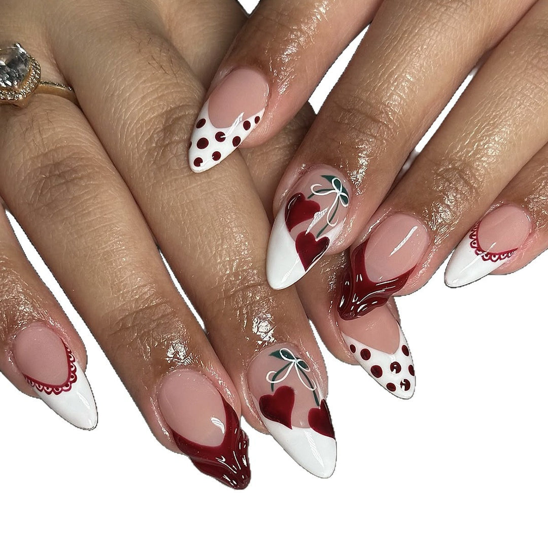 Creative nail art set with romantic heart design and playful accents Bowlift