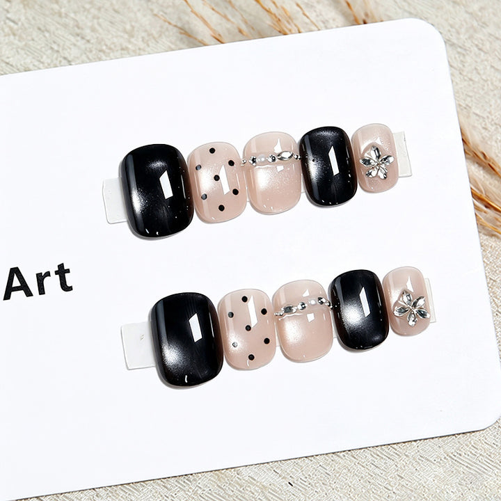 Acrylic nail set with glamorous accents and delicate designs Bowlift