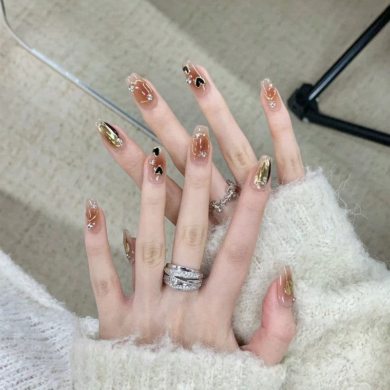 Artistic Press-On Nail Set with Heart and Glitter Accents Bowlift