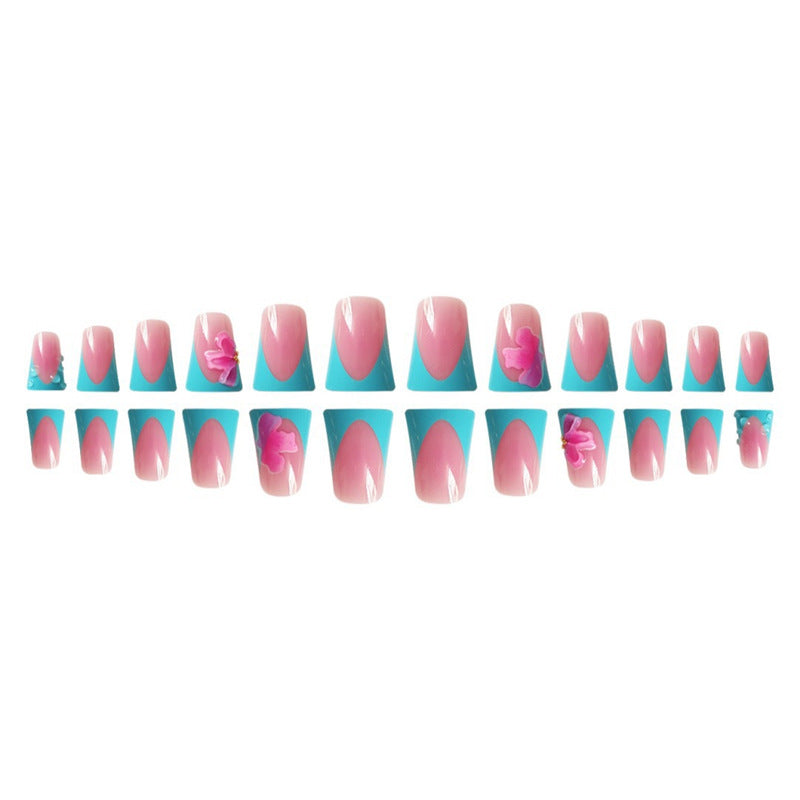 Artistic Press-On Nail Extensions with Floral Accents Bowlift