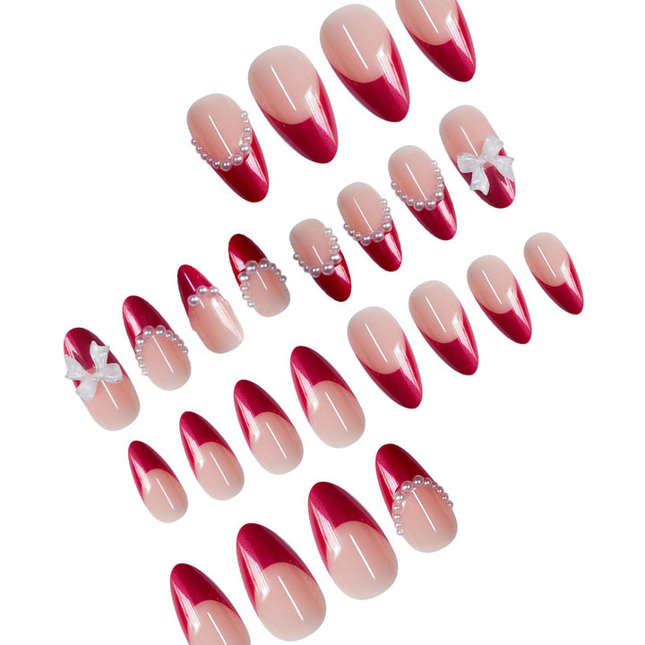 Decorative Stiletto Press-On Nails with Pearls and Bow Accents Bowlift