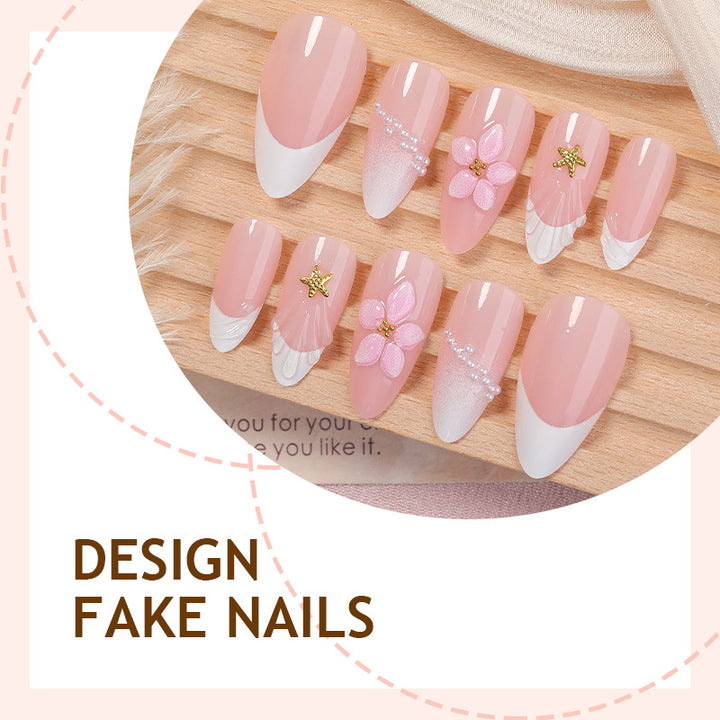 Artifical nail set with delicate flower and decorative elements Bowlift