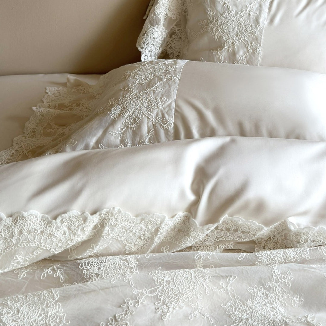 Luxurious satin bedding set with fine lace and ruffled hem
