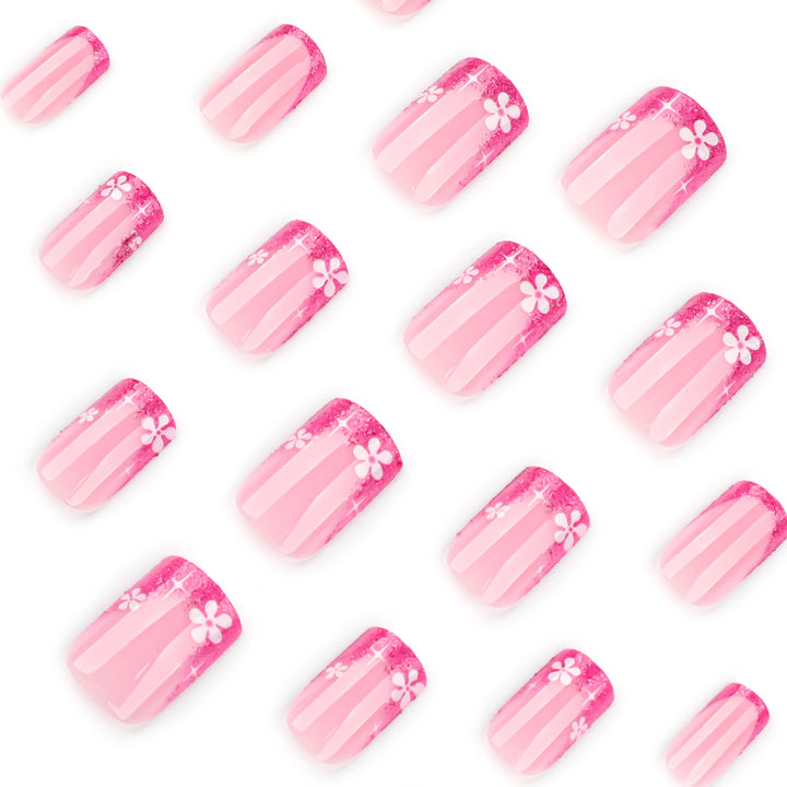 Artistic nail art with floral accent and glitter Bowlift