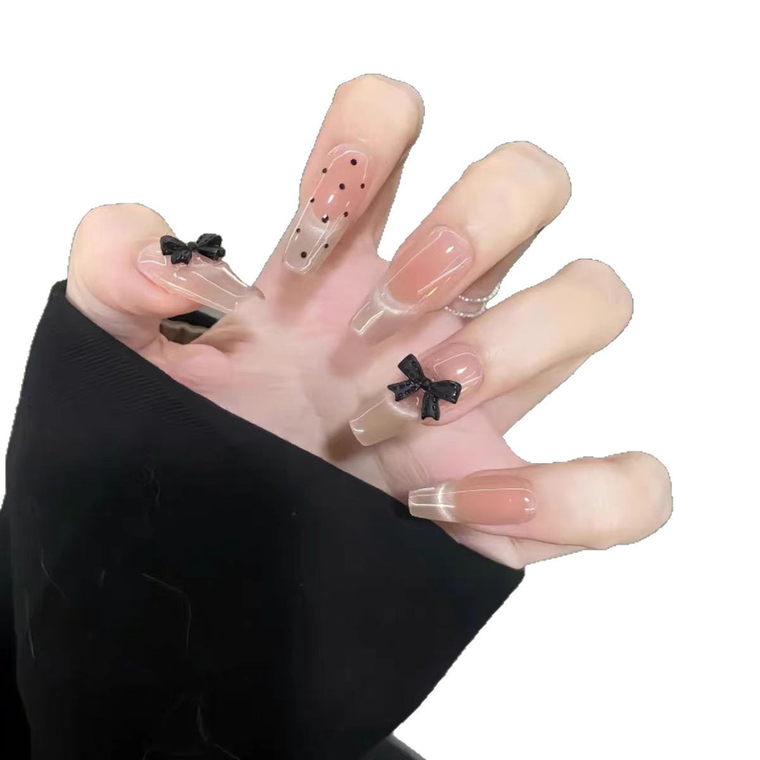 Artistic Long Stiletto Press-On Nails with Bow Accents Bowlift