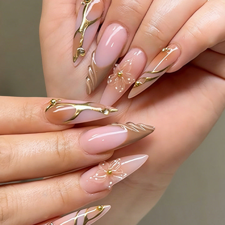 Nail art set with floral designs and glitter accents Bowlift