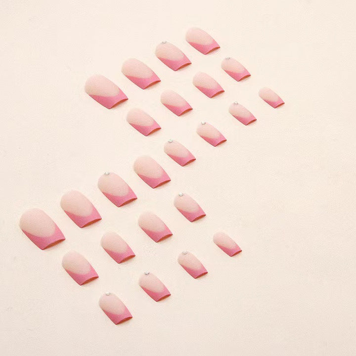 Nail set with elegant French design and glitter accents Bowlift