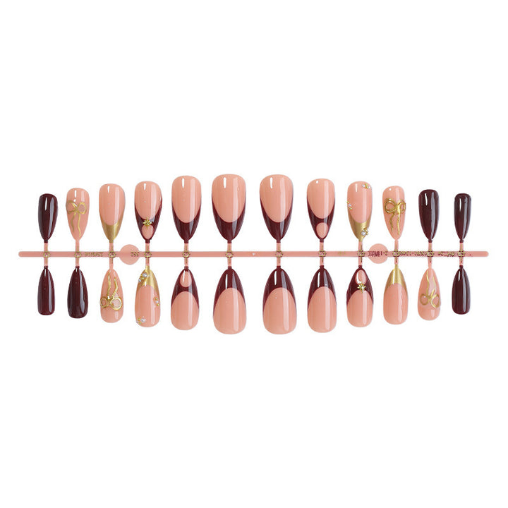 Artificial nail set with luxurious glossy design and creative accents Bowlift