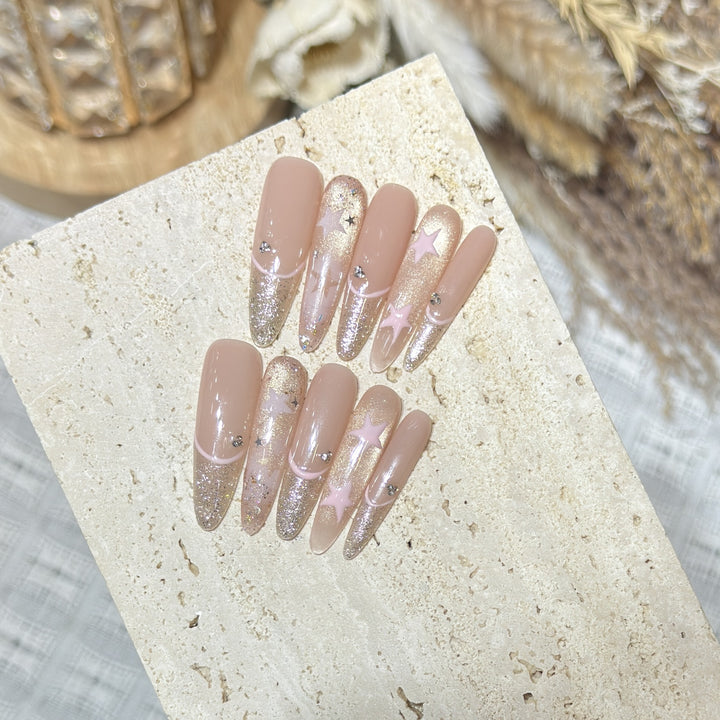 Elegant Stiletto Press-On Nail Art with Rhinestone Accents Bowlift
