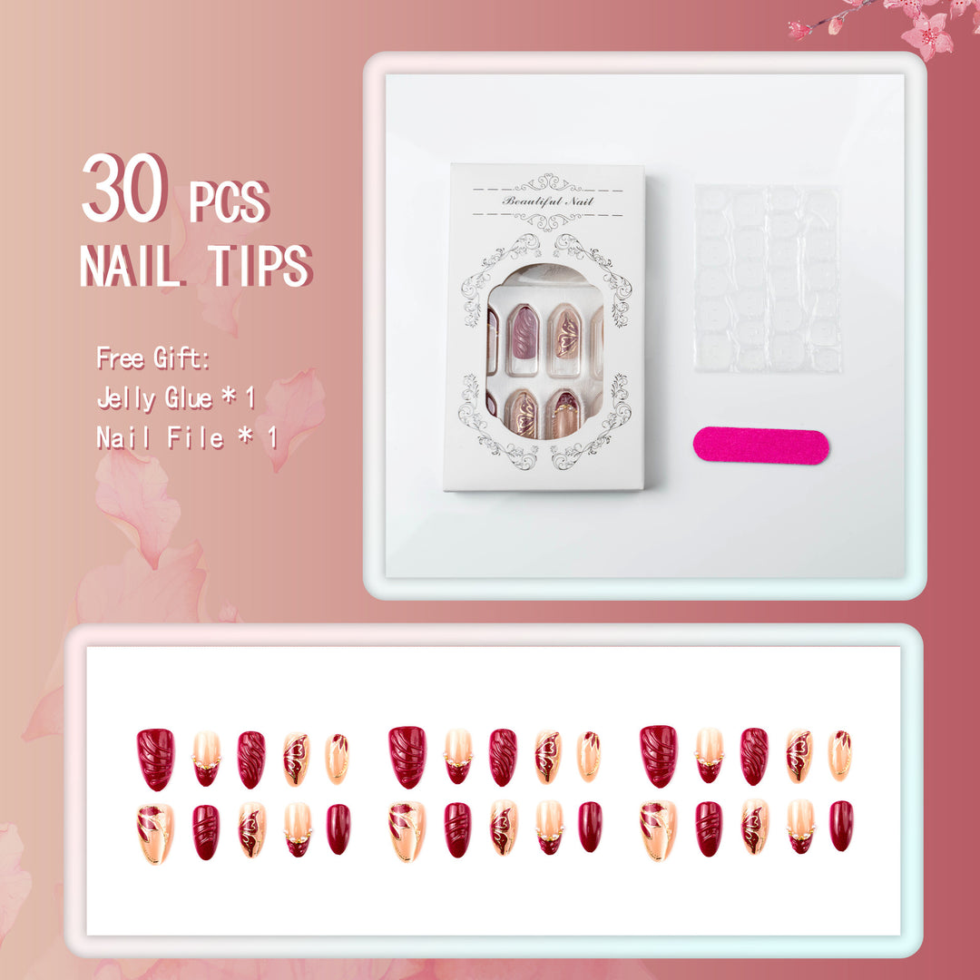 Artificial nail set with filigree golden decorations and romantic heart details Bowlift