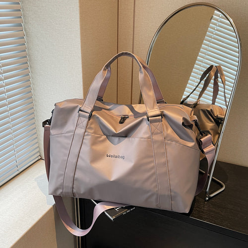 Multifunctional Sports And Travel Bag With Structured Surface Bowlift
